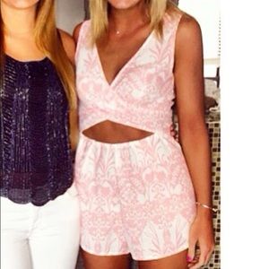 Pink romper with front and back cut out